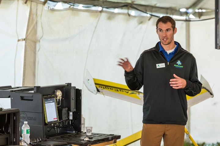 Nolan presenting to a group of growers at Peterson Farms Seed’s annual Field Day